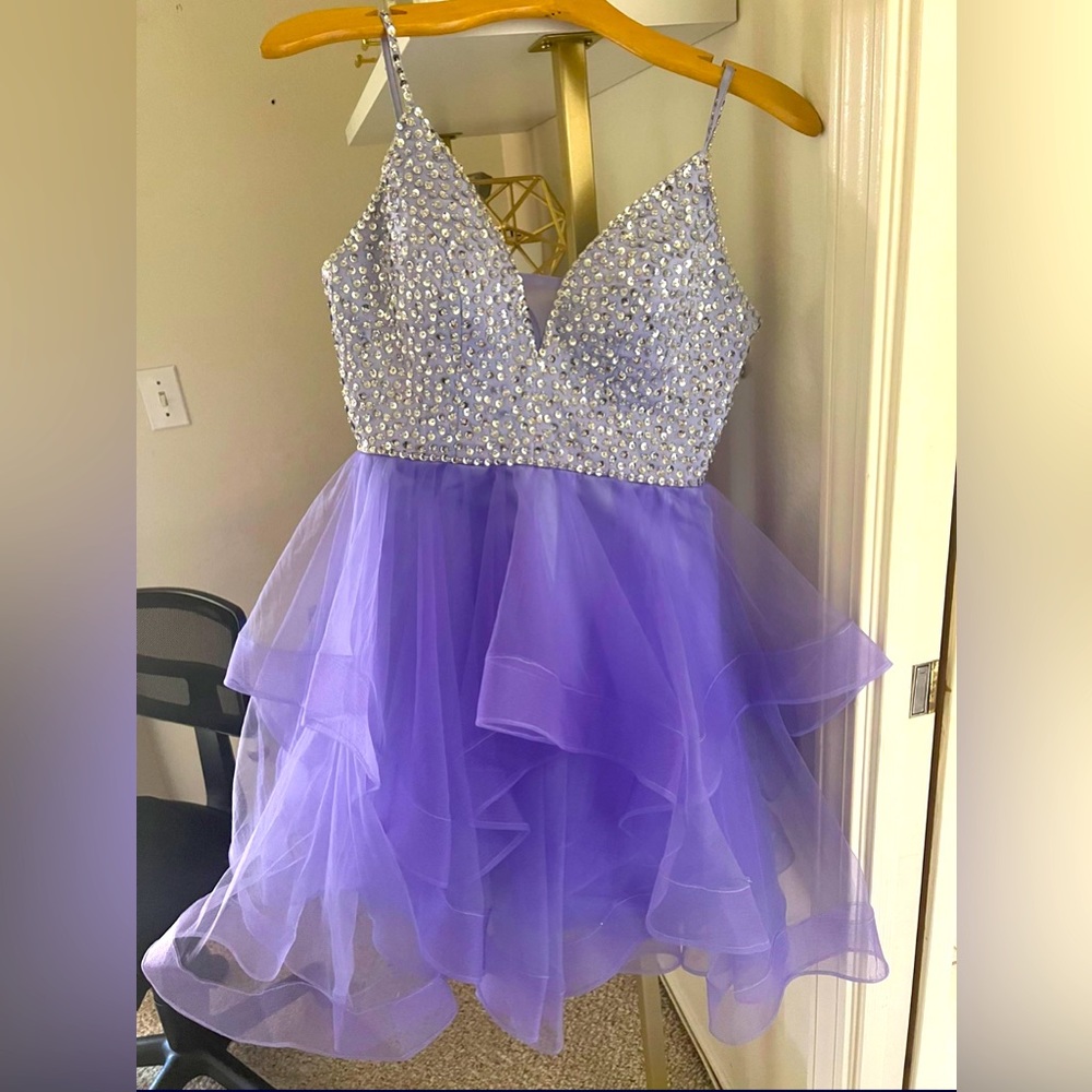 Lilac knee length Prom Dress/Women Size 4/worn once/zips and ties in the back.
